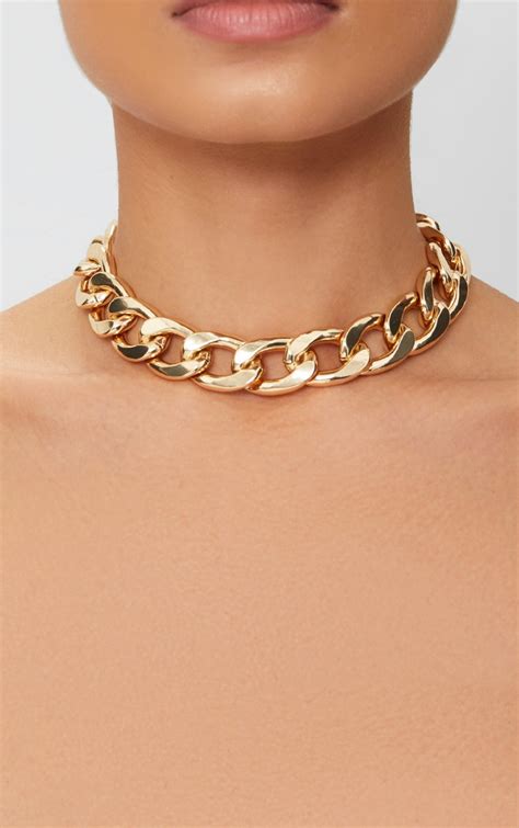 gold choker thick chain necklace.